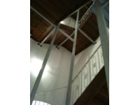 Unterkonstruktion fr Aufzug in denkmalgeschtztem Bestand mit gleichzeitiger Abfangung der alten Holztreppe